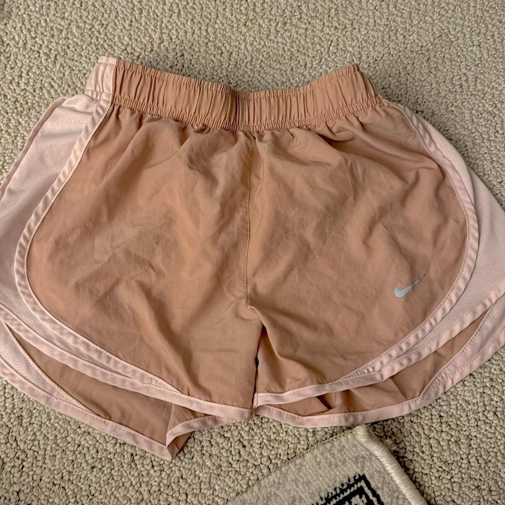 Nike: nude-ish pink athletic shorts